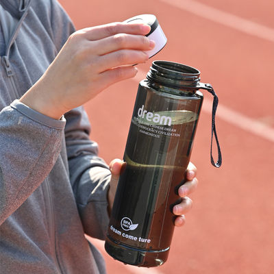 Botella de PET portátil de 1L ecológica con marca de capacidad para deportes físicos