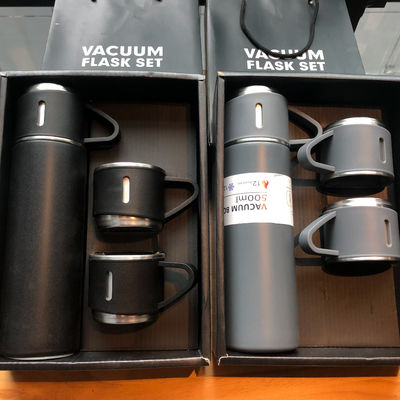 Capacidad 500ml Conjunto de regalos corporativos personalizados con botella de agua de acero inoxidable y tapas