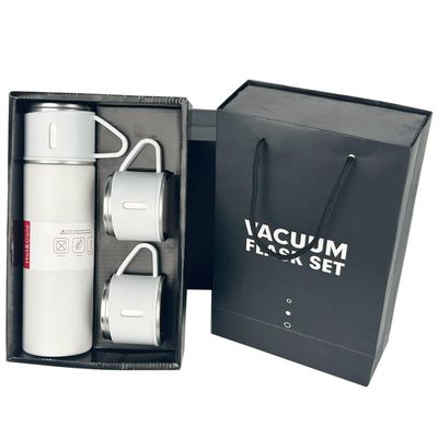 Capacidad 500ml Conjunto de regalos corporativos personalizados con botella de agua de acero inoxidable y tapas