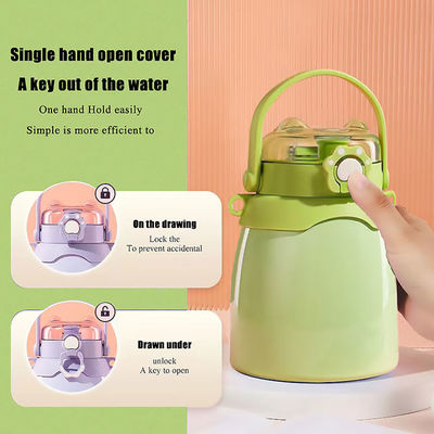 Presente Eco-friendly Impreso a medida térmico de doble pared aislada botella de agua de acero inoxidable con tapa de mango