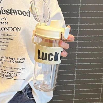 TOUR Botella de agua deportiva portátil de plástico de 600 ml con mango y gran capacidad