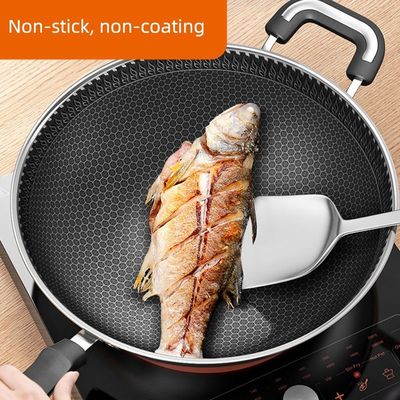 Revestimiento interior antiadherente Wok de acero inoxidable con calentamiento rápido y modelos personalizables