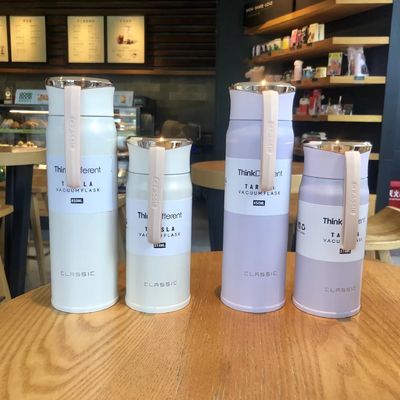 Botella de agua de acero inoxidable de 450 ml con doble pared aislada que mantiene el agua caliente y fría durante horas