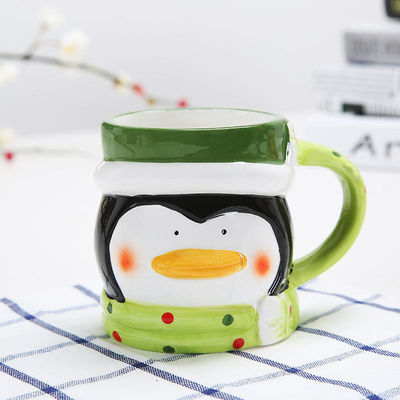 Taza de cerámica de Navidad personalizada con diseño de dibujos animados en 3D y color personalizado