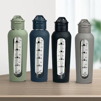 Botellas portátiles de vidrio con logotipo personalizado de 700 ml/1000 ml con mangas de silicona y marca de tiempo