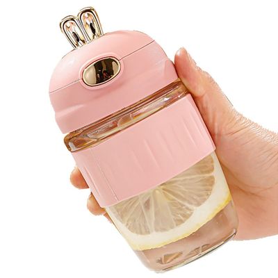 Popular estilo conejo portátil de vidrio reutilizable taza de agua con paja taza de café adecuado