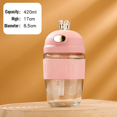 Popular estilo conejo portátil de vidrio reutilizable taza de agua con paja taza de café adecuado