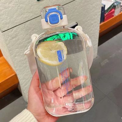 Botella de agua clara de 750 ml con cordón y tapa de resorte Taza de beber portátil libre de BPA