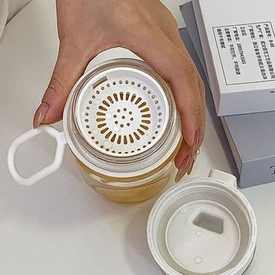 Botella de plástico PC resistente al calor Flip Top Botella de agua elegante con filtro extraíble