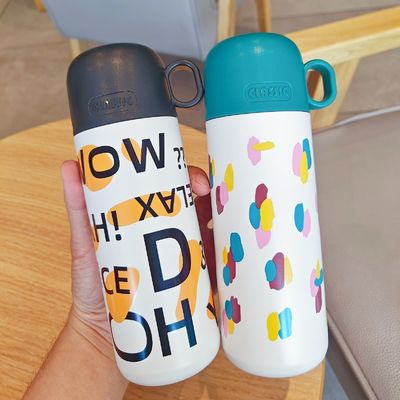 Flascos de vacío de color personalizados de acero inoxidable 500 ml Taza térmica aislada con tapa