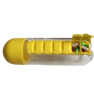 Agua hirviendo multifuncional 600ml 2 en 1 botella de agua de plástico diaria con caja de pastillas de siete días