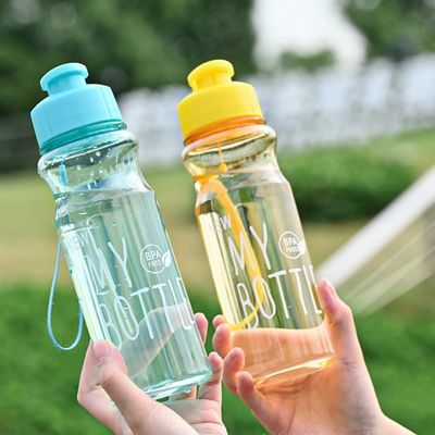 Botella de agua transparente de plástico PET de 500 ml personalizada para hidratación al aire libre
