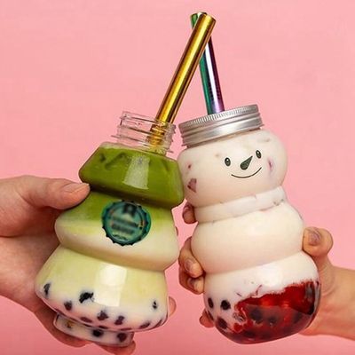 Botella de Navidad de hombre de nieve de plástico PET personalizado de 500 ml para decoración de bebidas personalizada