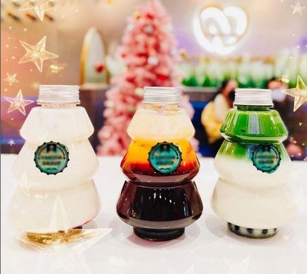 Botella de Navidad de hombre de nieve de plástico PET personalizado de 500 ml para decoración de bebidas personalizada