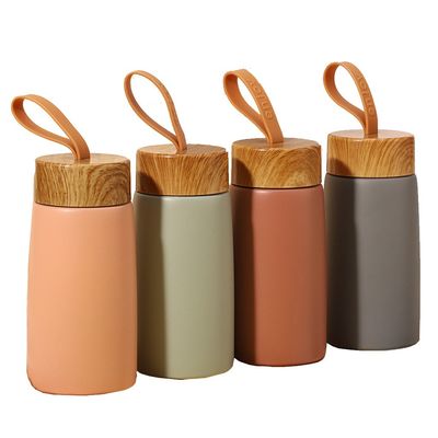 Muestra 280ML Copa de acero inoxidable de grano de madera para el logotipo personalizado Botella de agua deportiva para niños