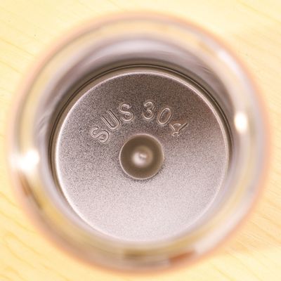 Muestra 280ML Copa de acero inoxidable de grano de madera para el logotipo personalizado Botella de agua deportiva para niños