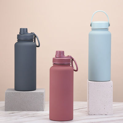 Botellas de agua de acero inoxidable de 1 litro con mango y botella de plástico de vacío sobresaliente