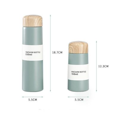 Térmosas de vacío de acero inoxidable 304 personalizadas Bpa Bebidas para niños Botella de agua con tapa de madera